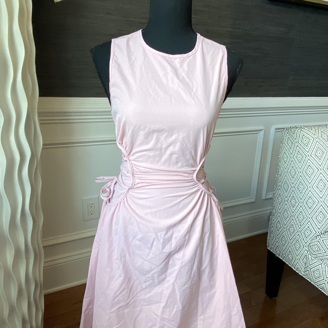 Pink maxi dress with a tie detail on sides. Very... - Depop