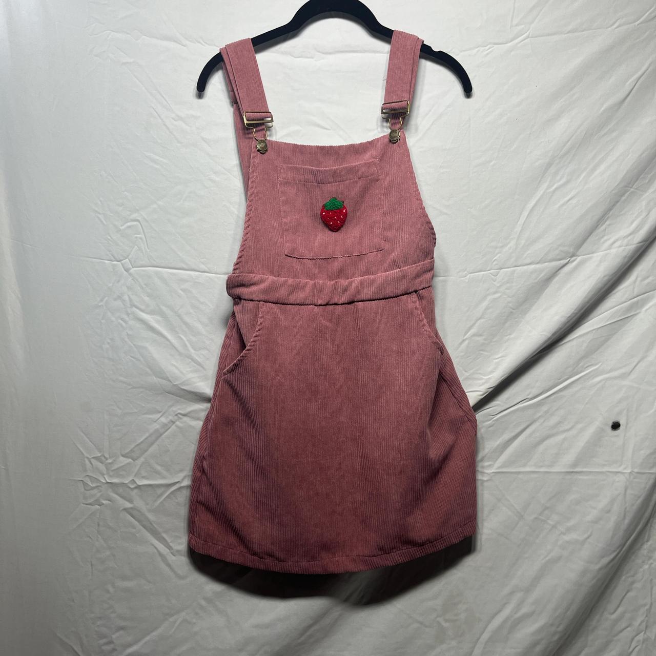 Pink corduroy overall dress with adjustable