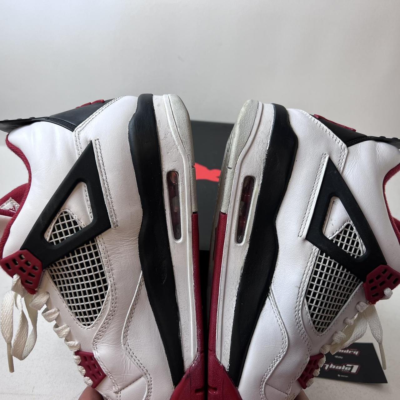 aged jordan 4 fire red
