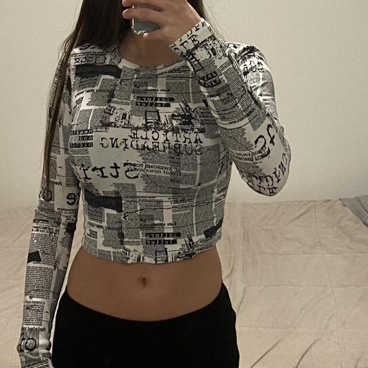 White newspaper print crop top with long sleeves. | Depop
