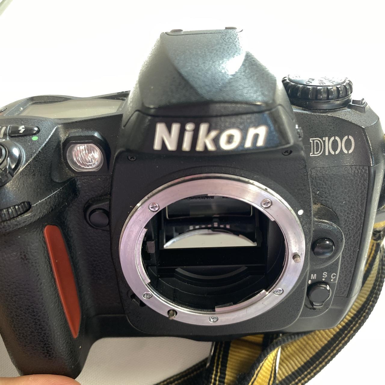 Nikon D100 camera body only with strap and battery... - Depop