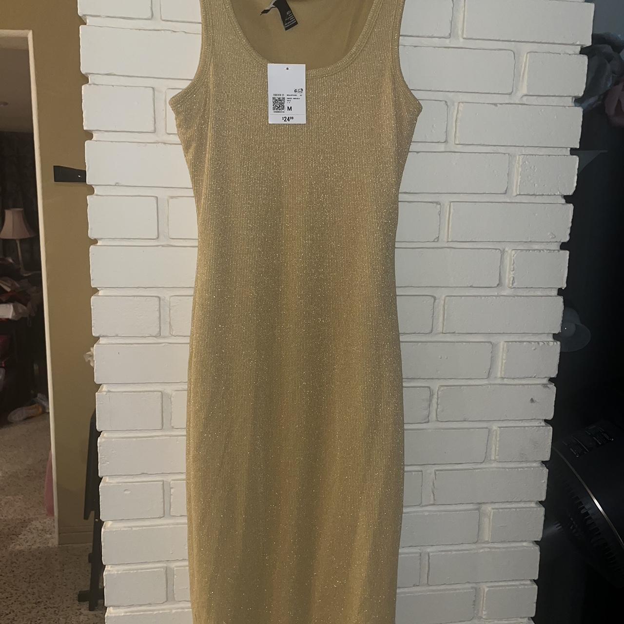 Forever 21 Gold glitter maxi dress with a slight. Depop