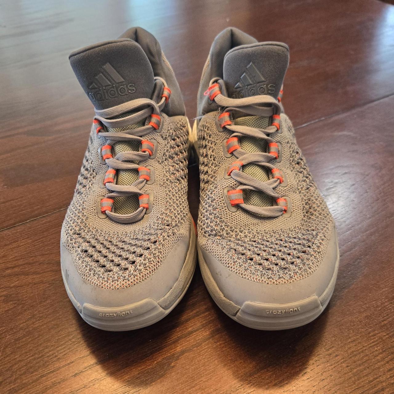 Adidas gray mens trainer, right shoe slight