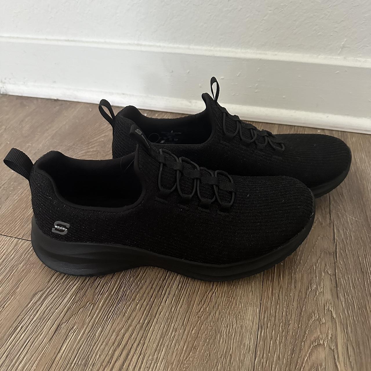 Solid black skechers online