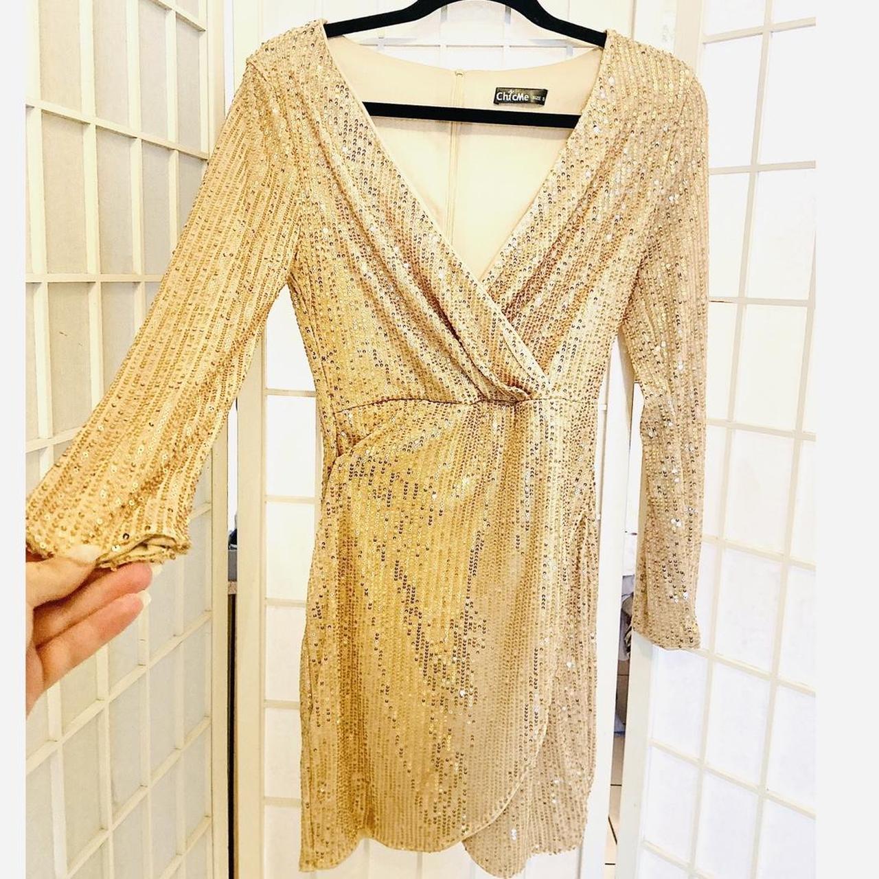 Beyoncé gold sequin dress with a V-neckline and