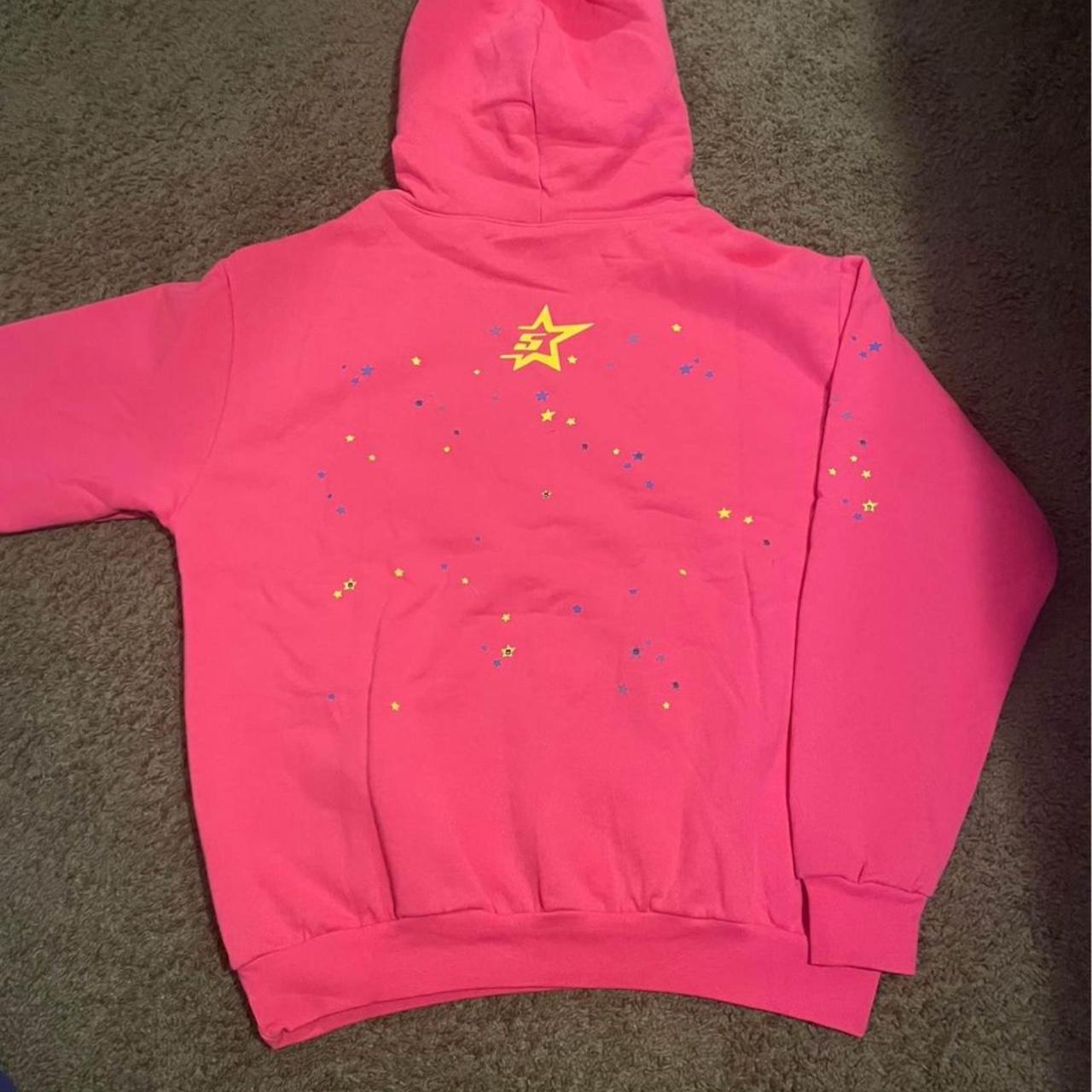 Pink and yellow hoodie with a star design