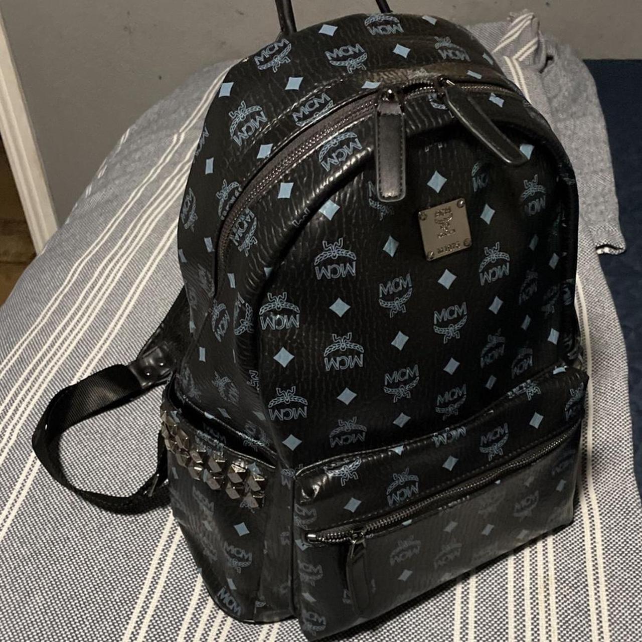 Blue and black mcm bag on sale