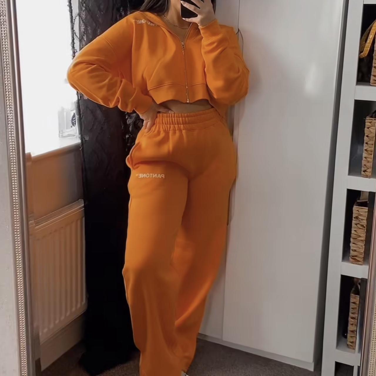 Orange nike jumpsuit on sale womens