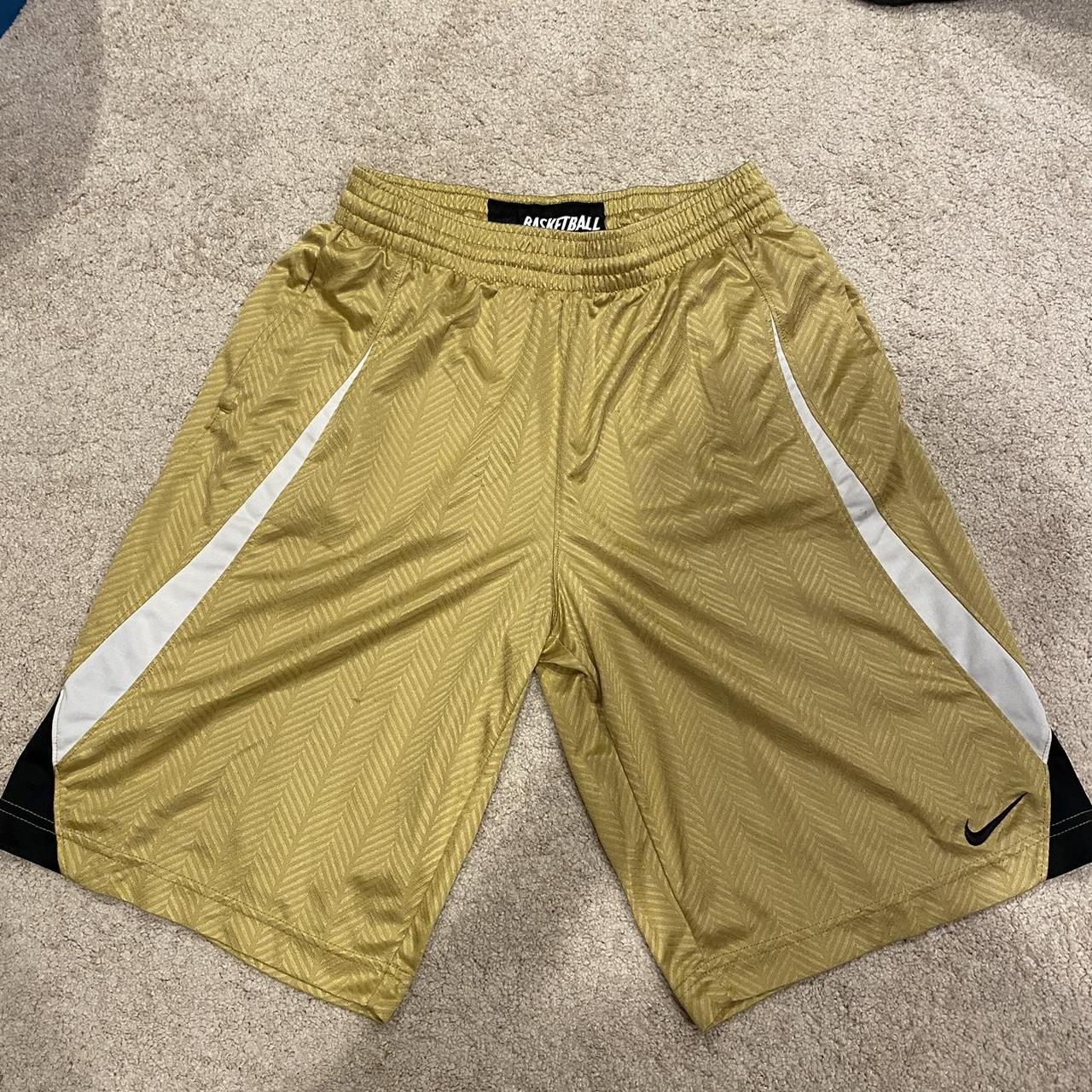 nike shorts gold and black