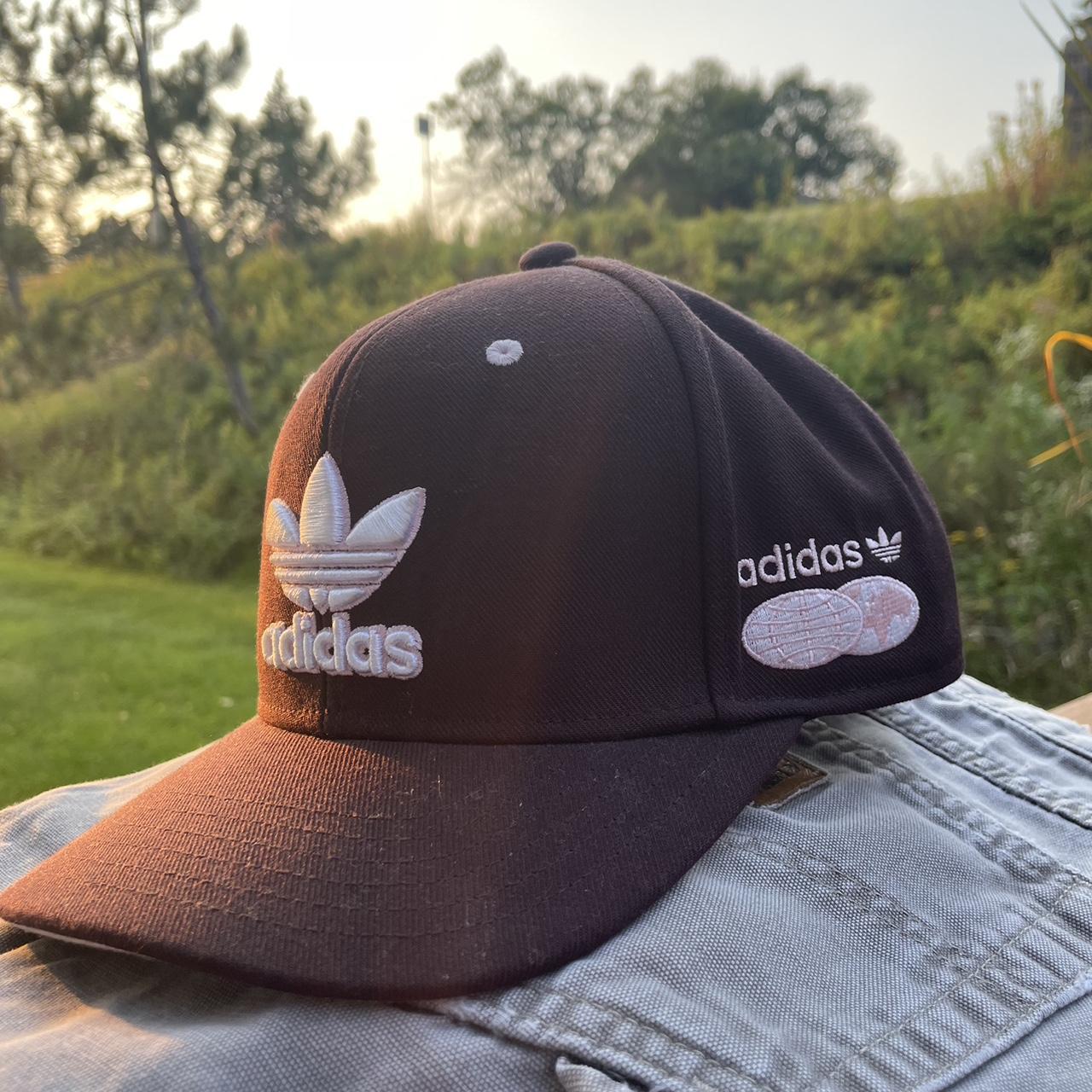 Vintage Adidas Cap Brim has some brown spots on