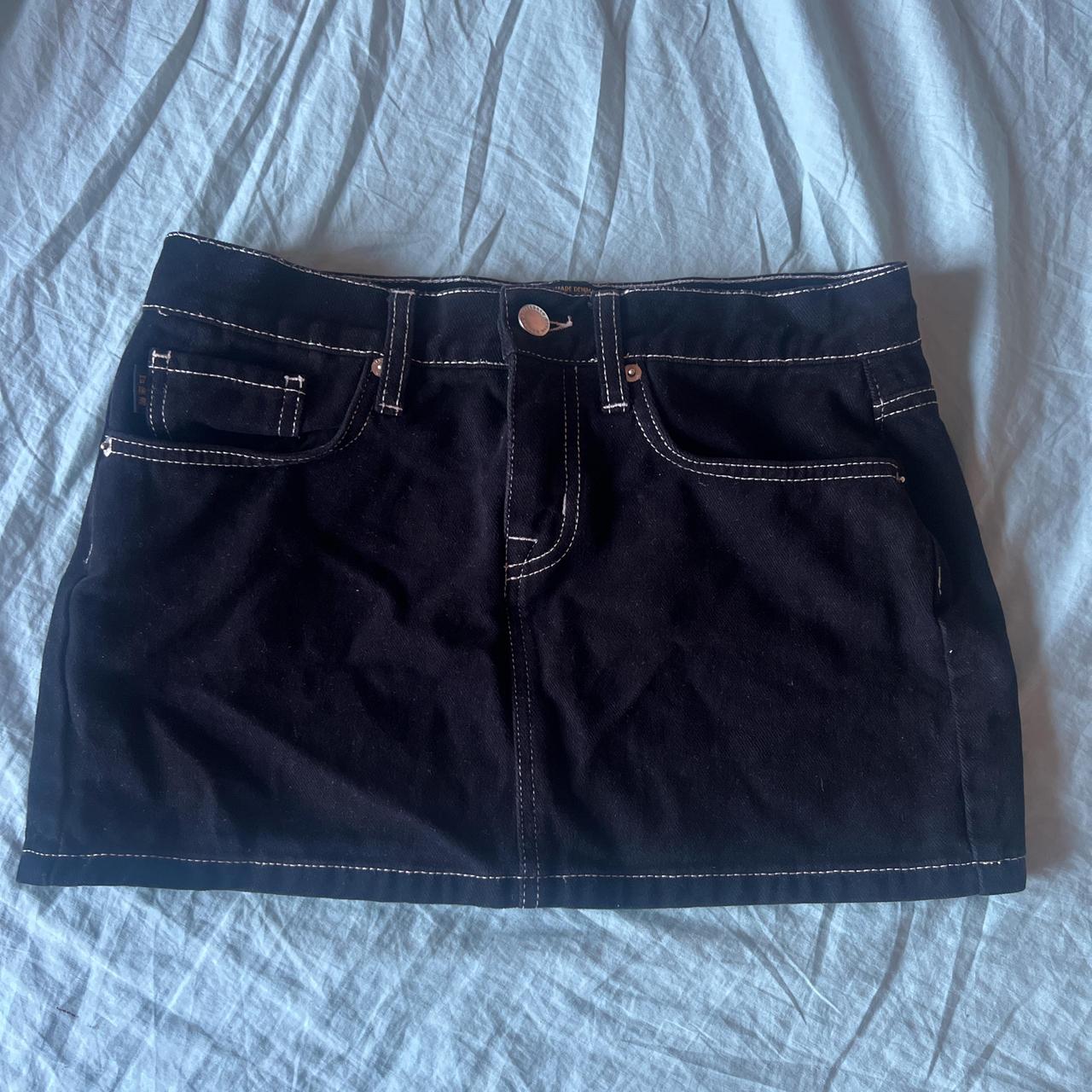 Superdry's black denim mini skirt with white... Depop