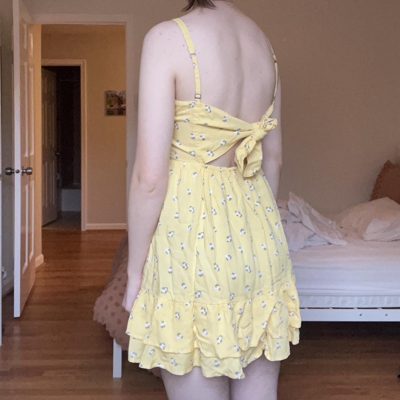 Item: Hollister yellow flower mini dress Brand: - Depop