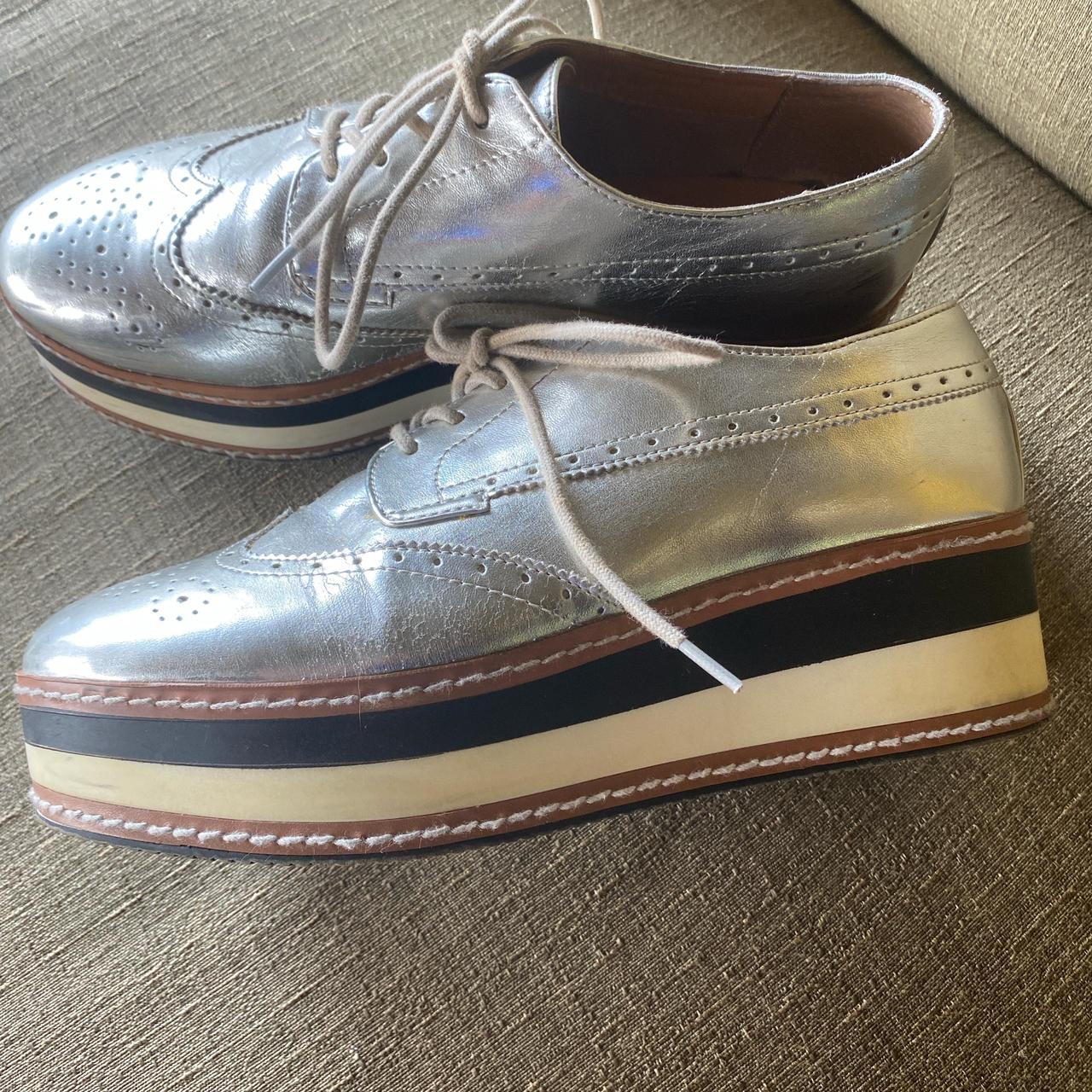 Silver brogue oxfords with a slight platform oxfords