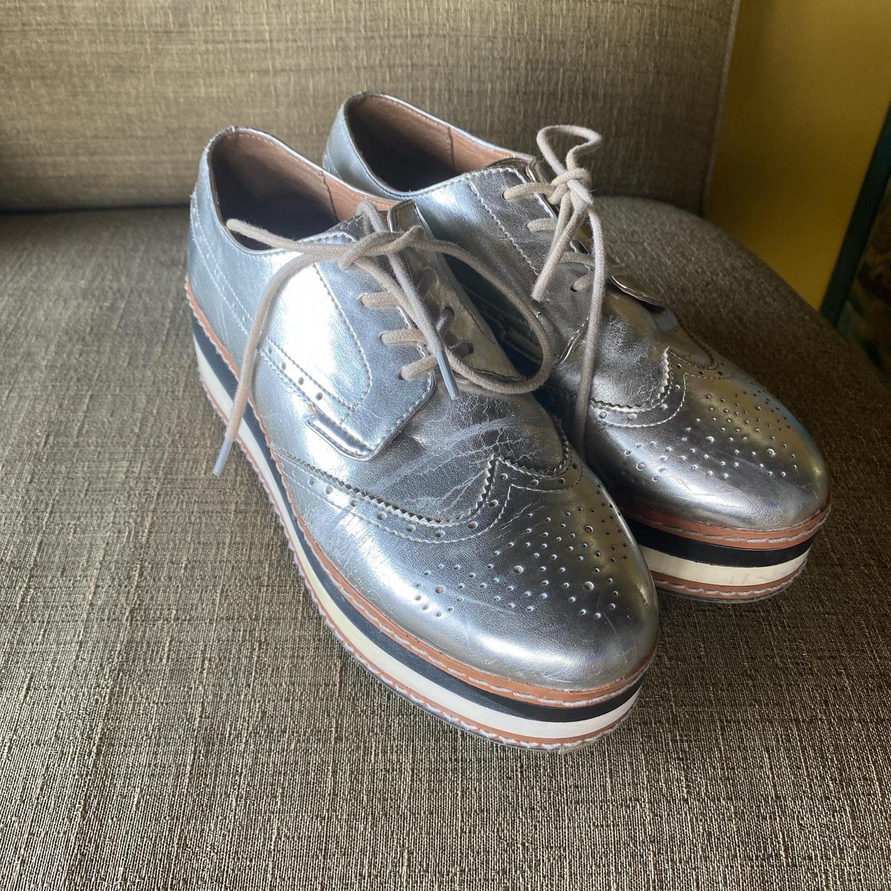 Silver brogue oxfords with a slight platform oxfords