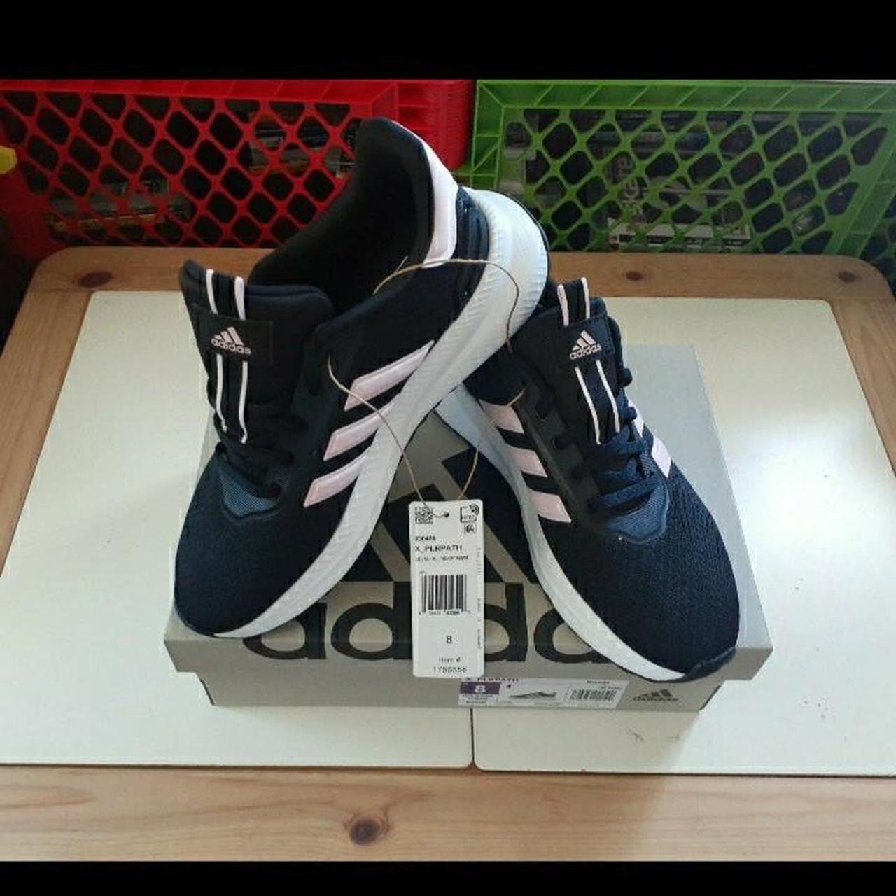 Black adidas shoes with pink stripes best sale