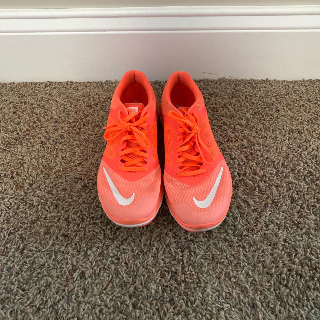 Orange neon nike shoes best sale