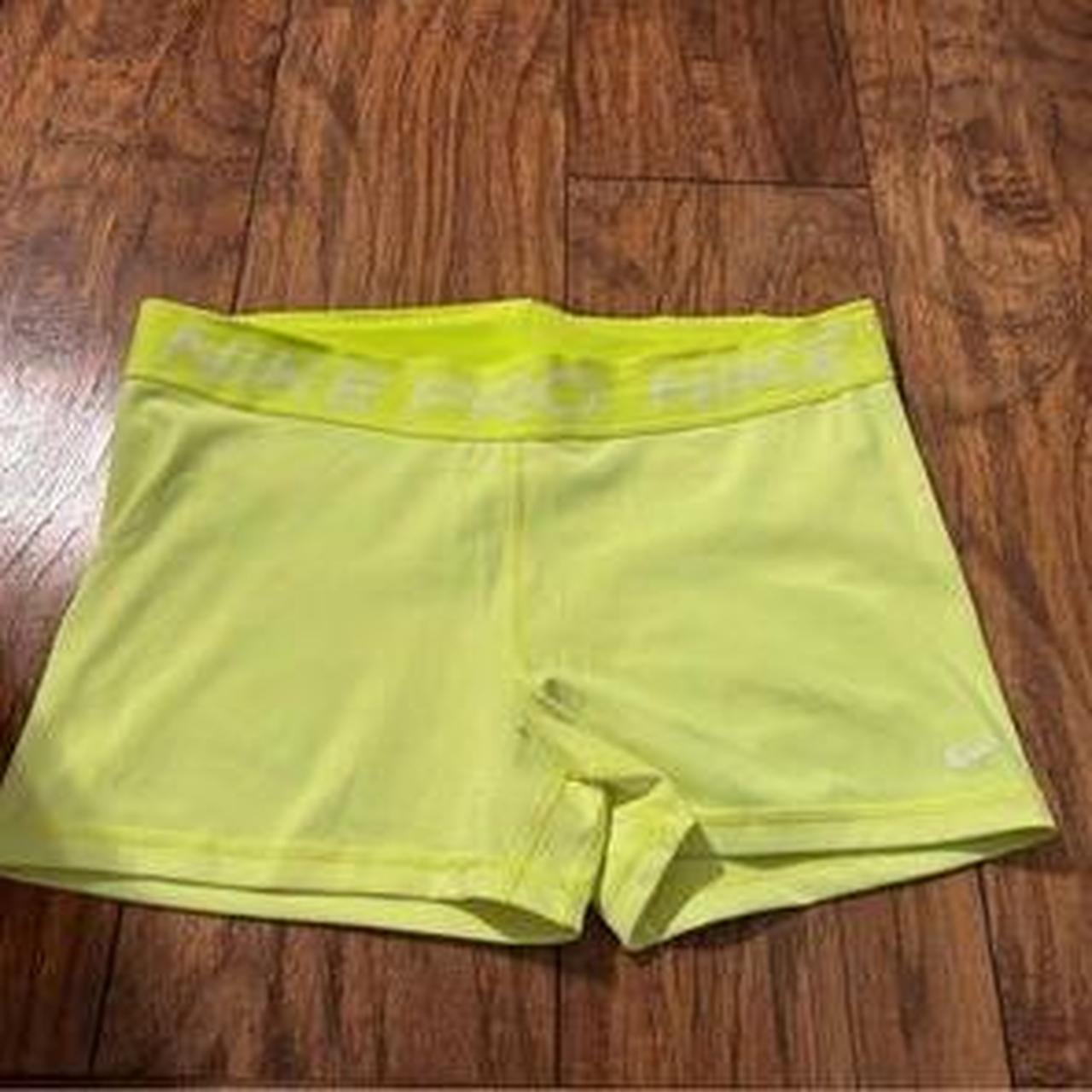 neon yellow nike shorts womens