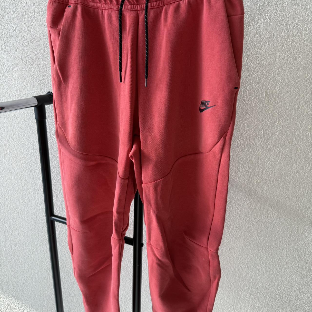 Red nike tech sweatpants deals