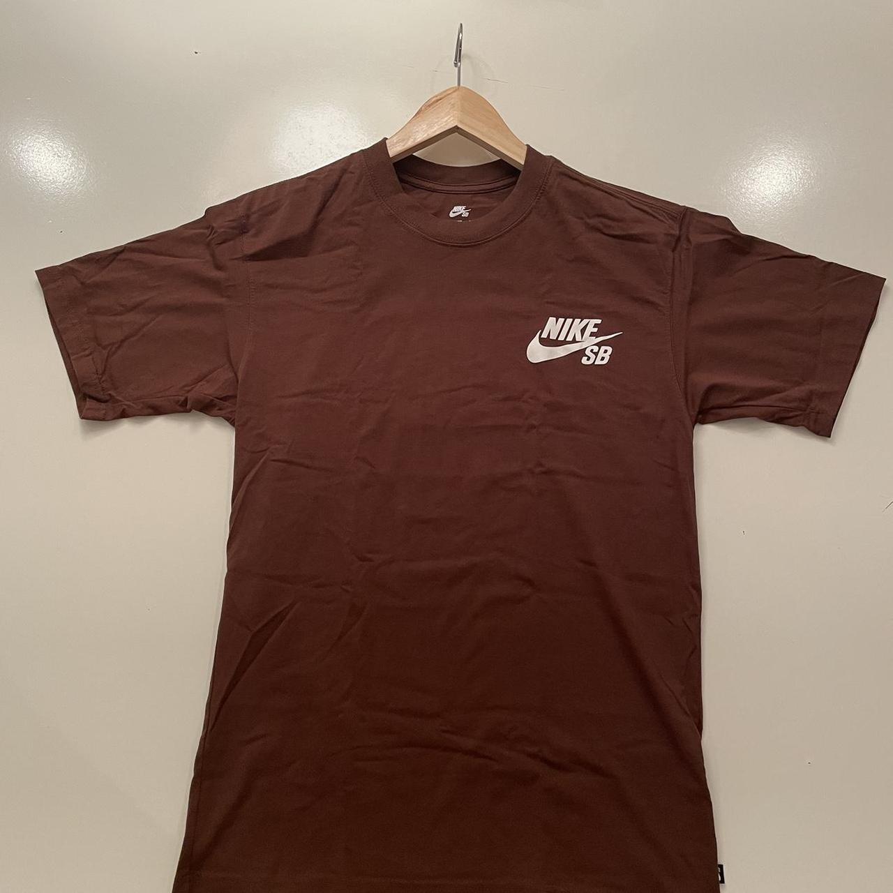 Selling a Nike men s XS shirt in a stylish brown. Depop