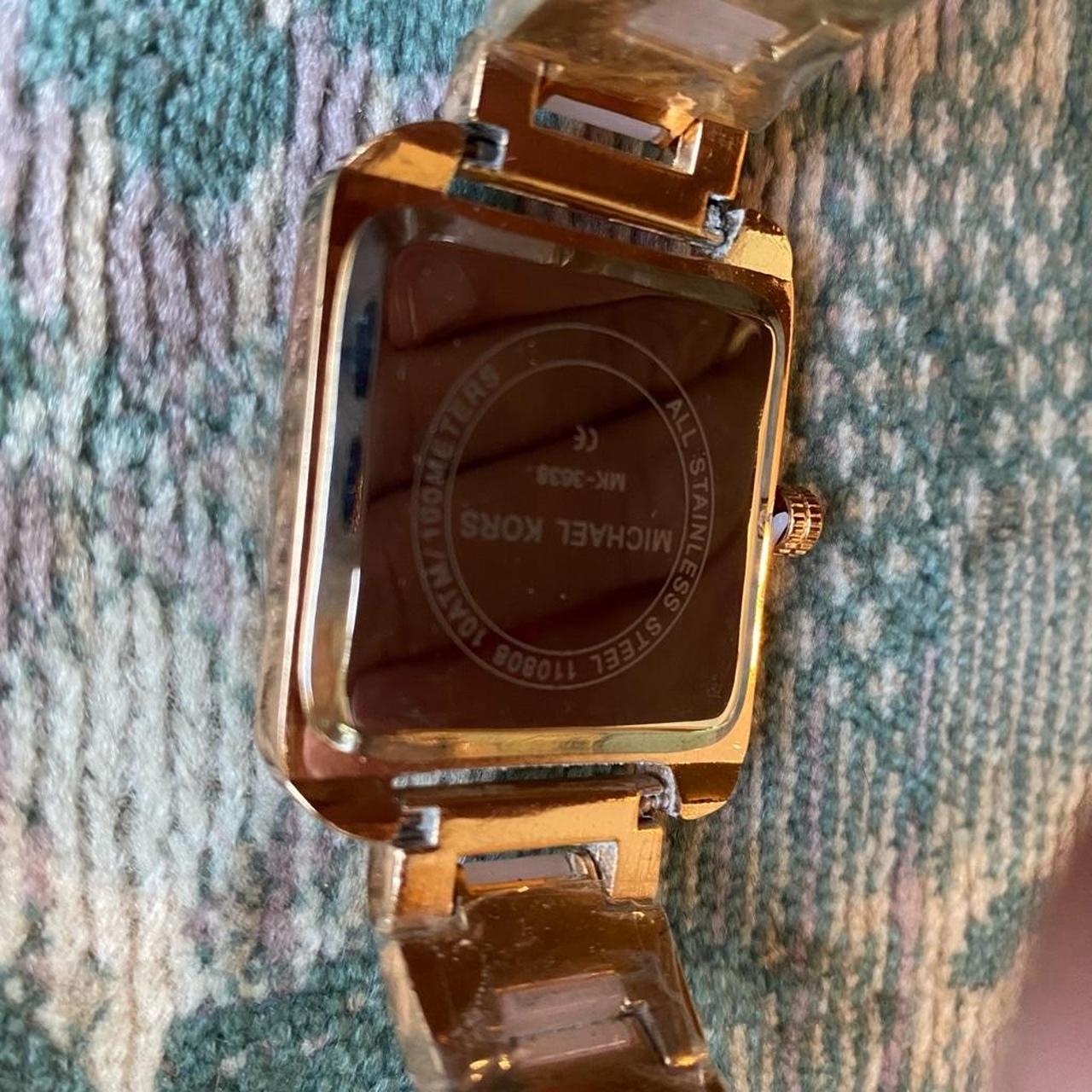 This is a new Michael Kors women s watch with a rose. Depop