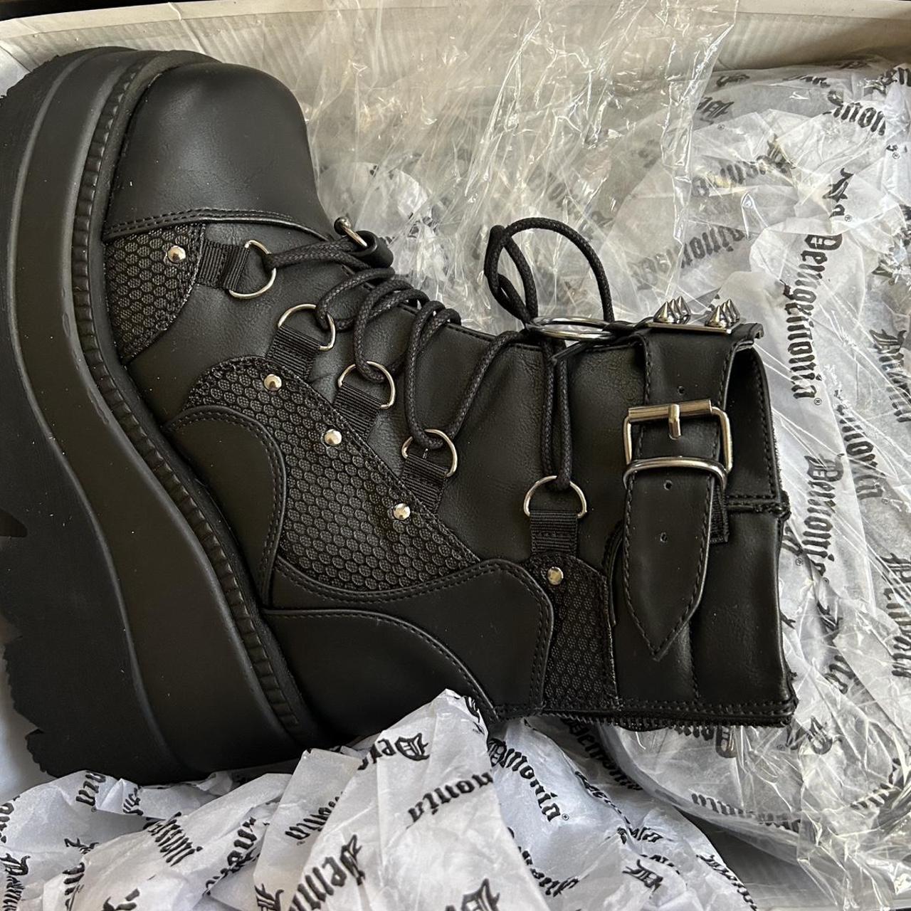 Demonia Women's Black and Silver Boots | Depop