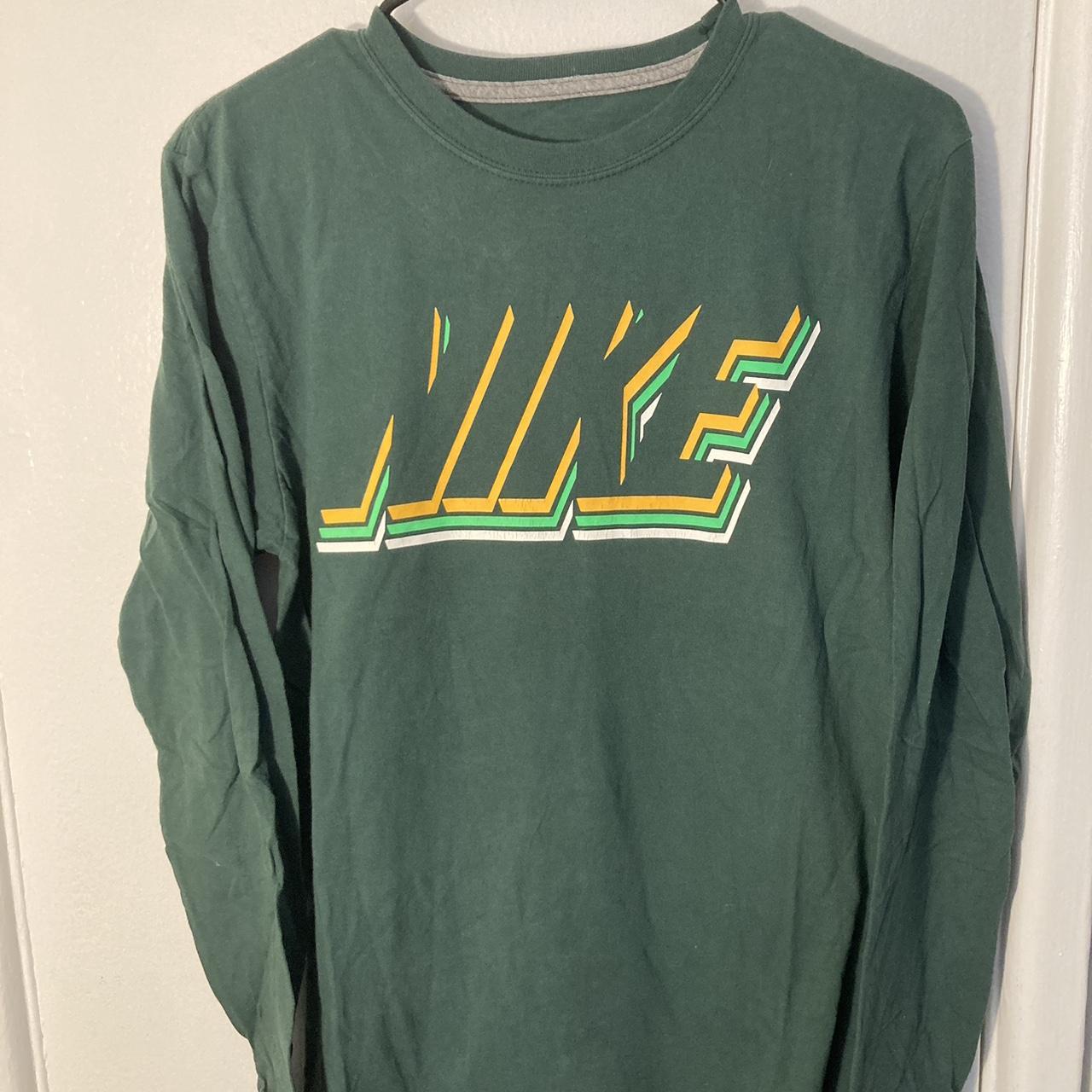 Nike spell out chest logo green yellow Oregon colors... - Depop