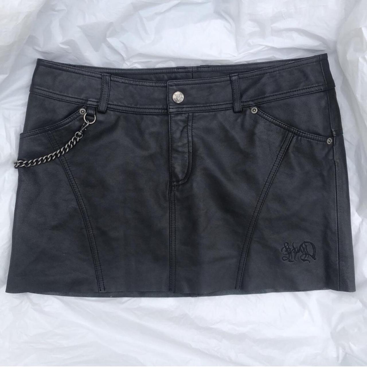 Black leather mini skirt with silver chain detailing. Depop