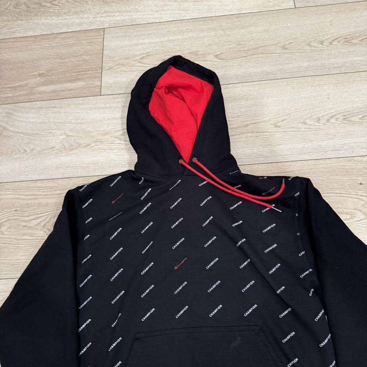 Black and red champion hoodie hotsell