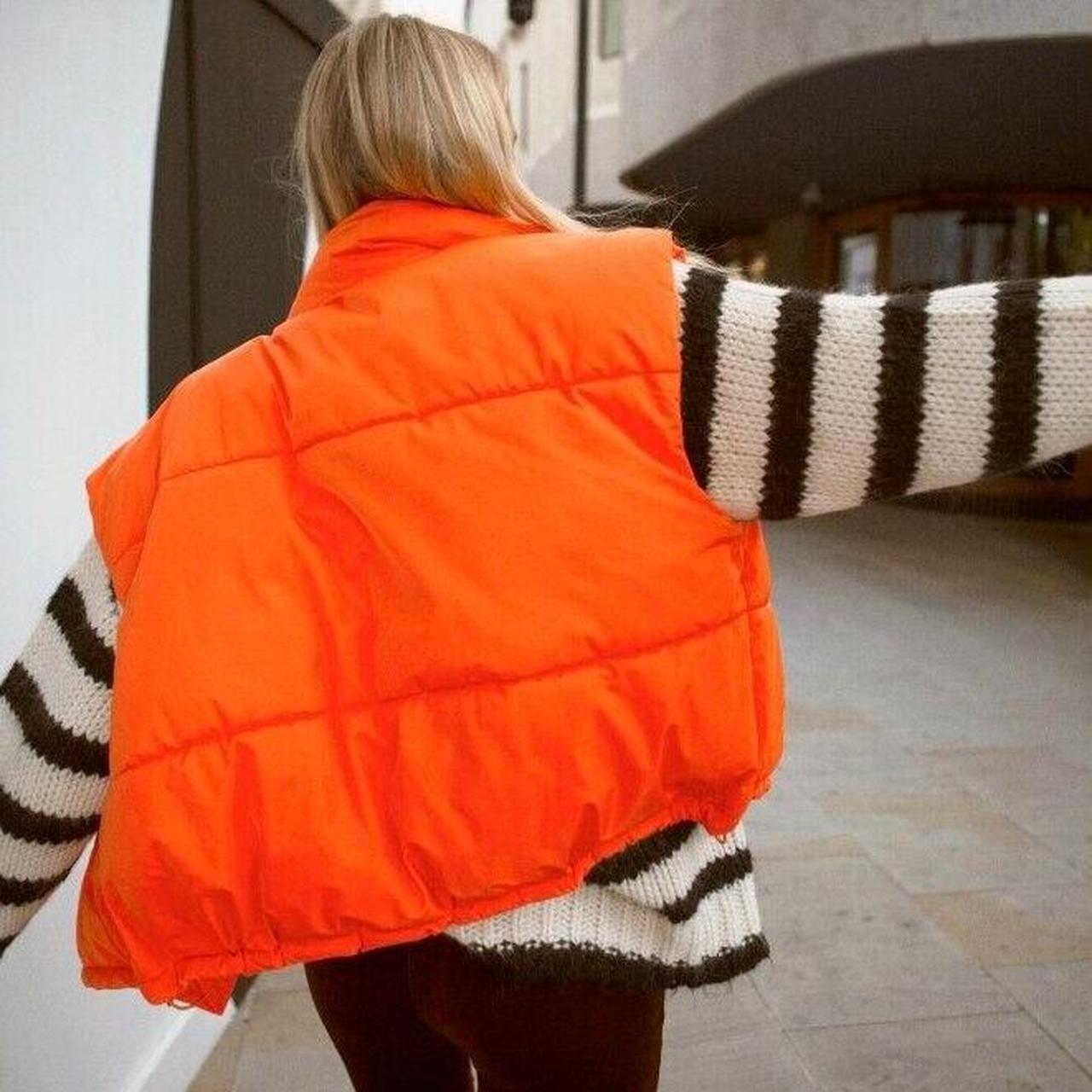 Orange puffer vest womens online