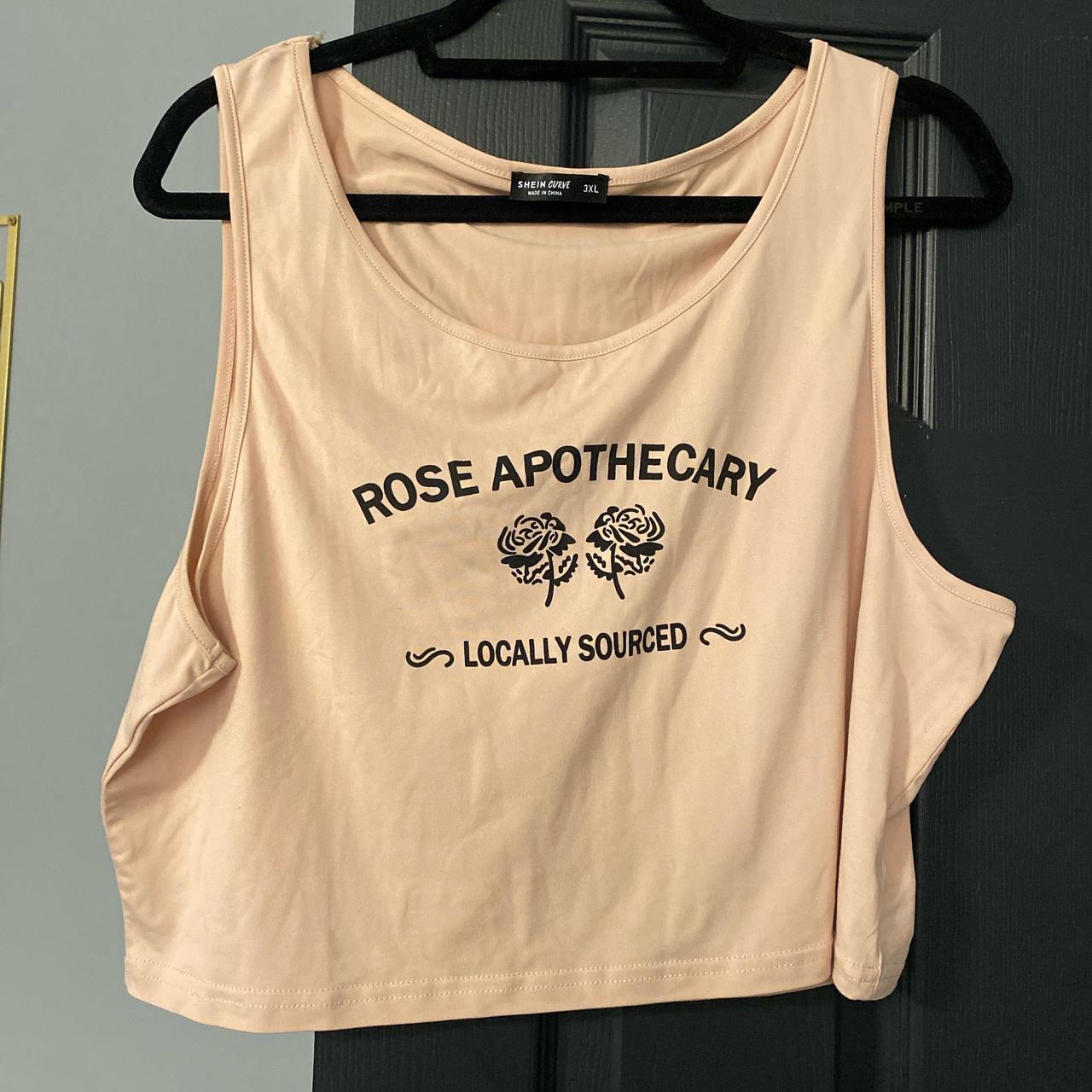 Light pink Rose Apothecary crop top, graphic detail... | Depop