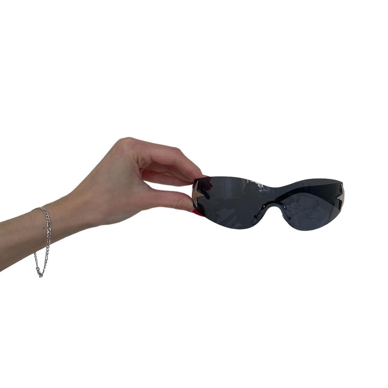 Y2K sports sunglasses 00s style rimless wrap... Depop