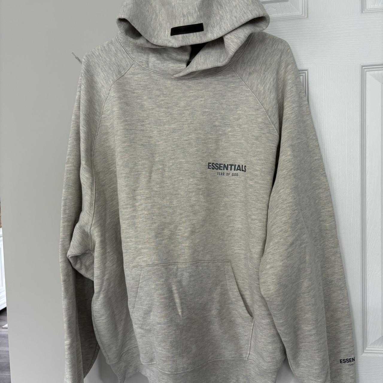 Fear of god essentials hoodie sizing online