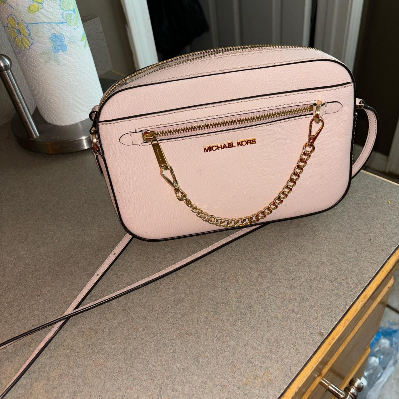 Michael purchases Kors Light Pink Crossbody and Wallet