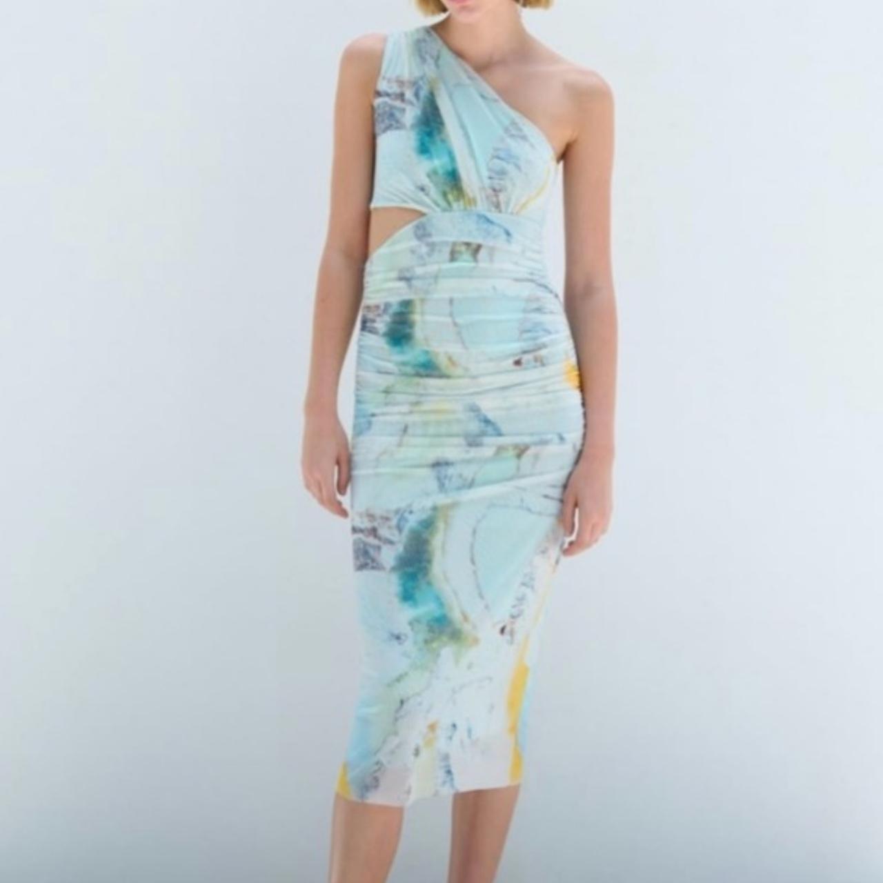 One shoulder midi dress with a ruched side and a