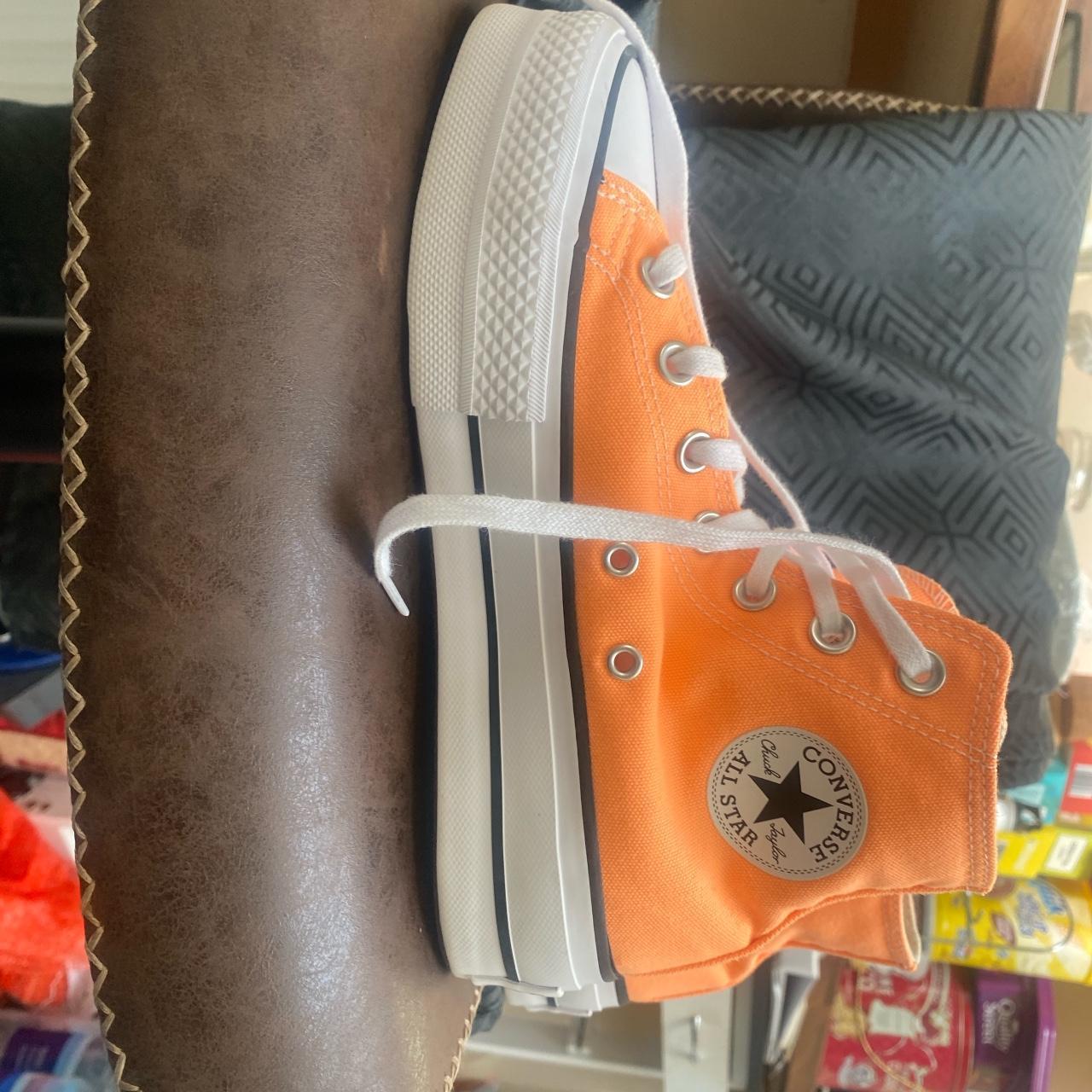 Size 4 Orange converse Worn once Bit of mud on the. Depop