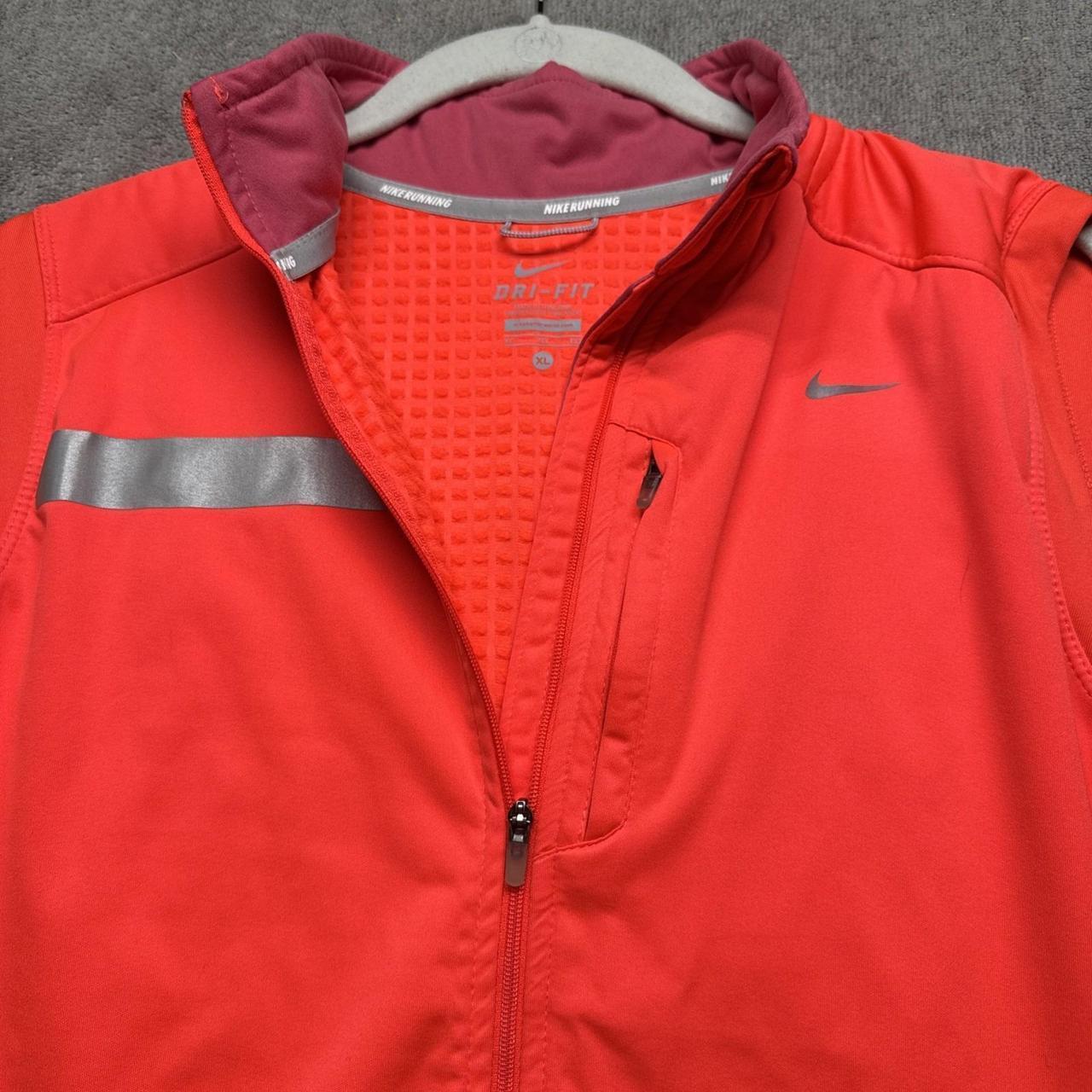 red nike gilet