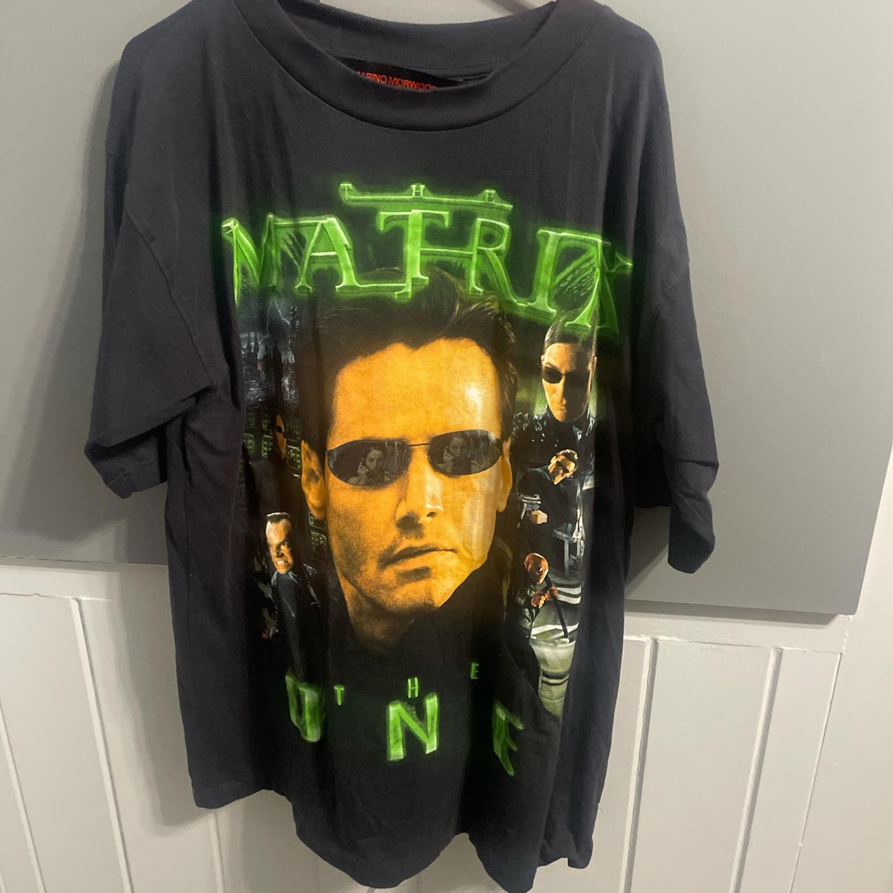 Marino Morwood buying The Matrix T-shirt