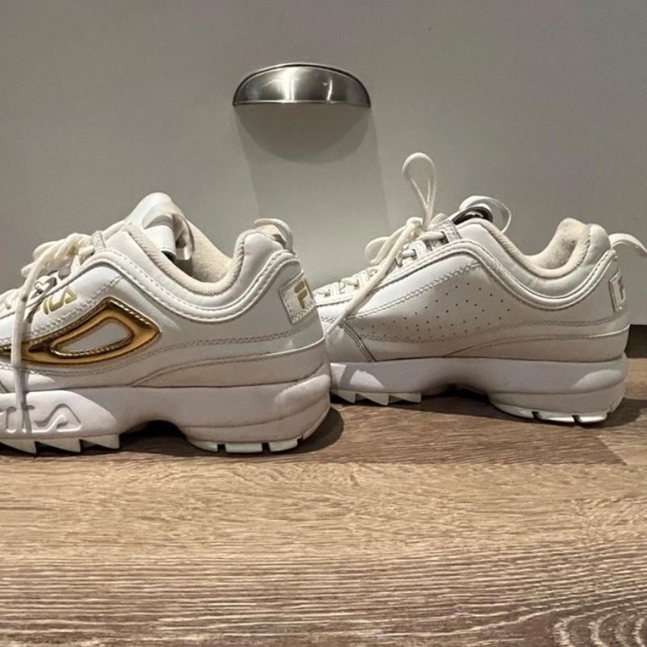 Fila Disruptor II white and gold trainers Depop