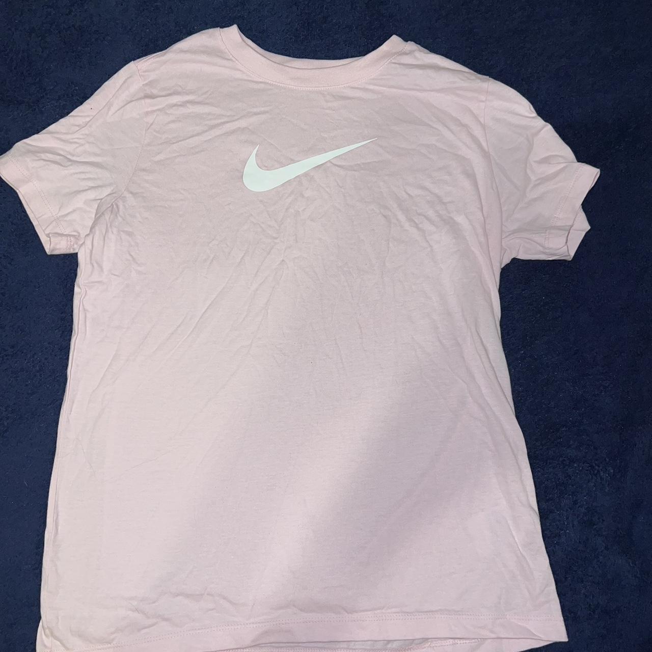 pale pink nike shirt