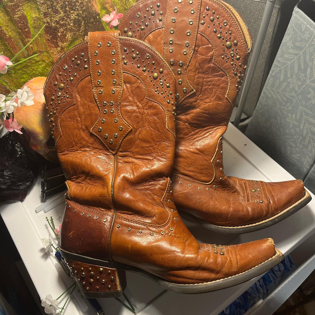 Ariat Studded brown leather cowboy boots with a