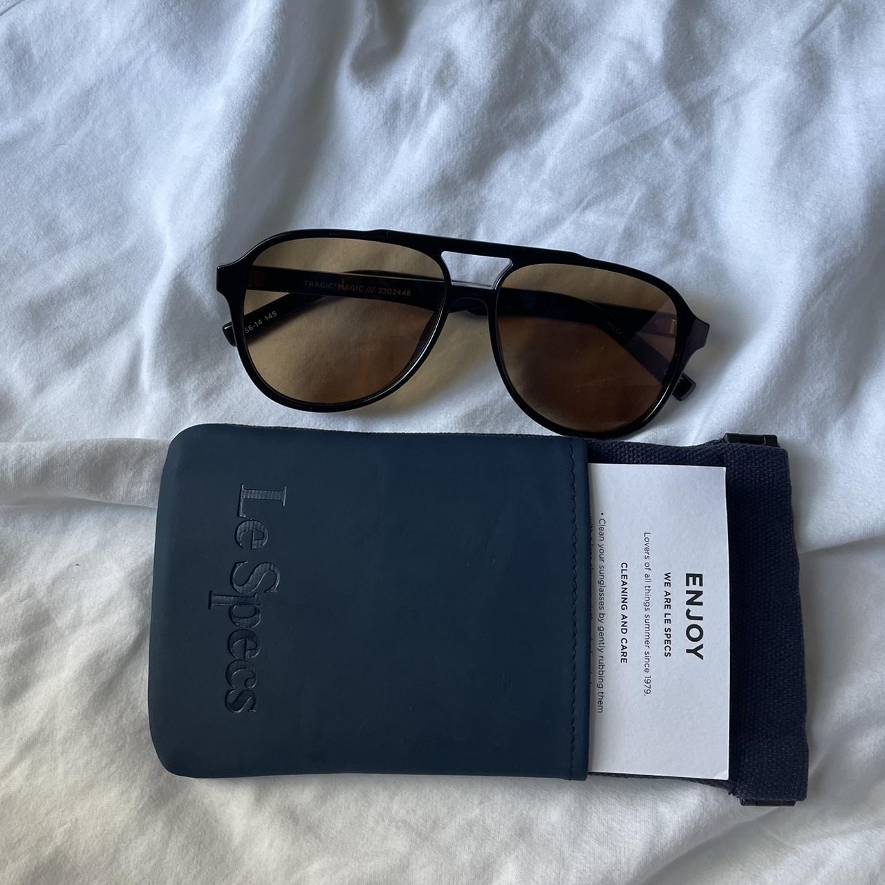 le specs in tragic magic. black frame brown lenses.... - Depop