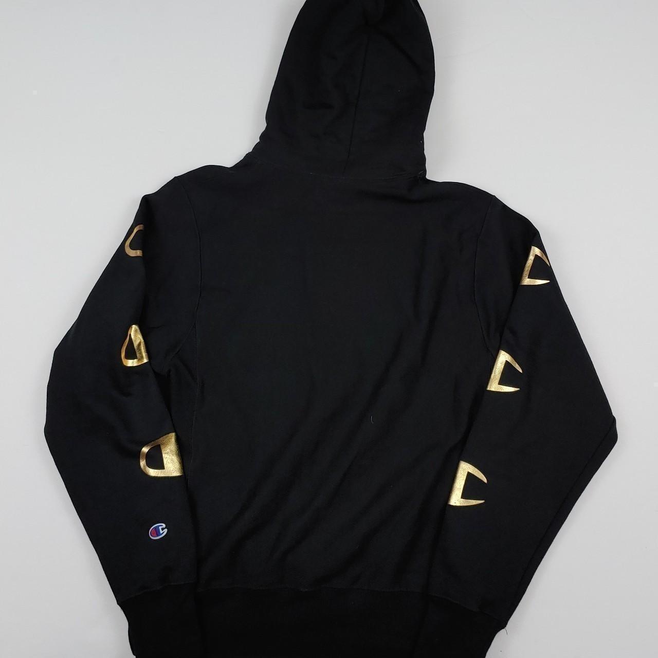 Champion hoodie 2025 black gold