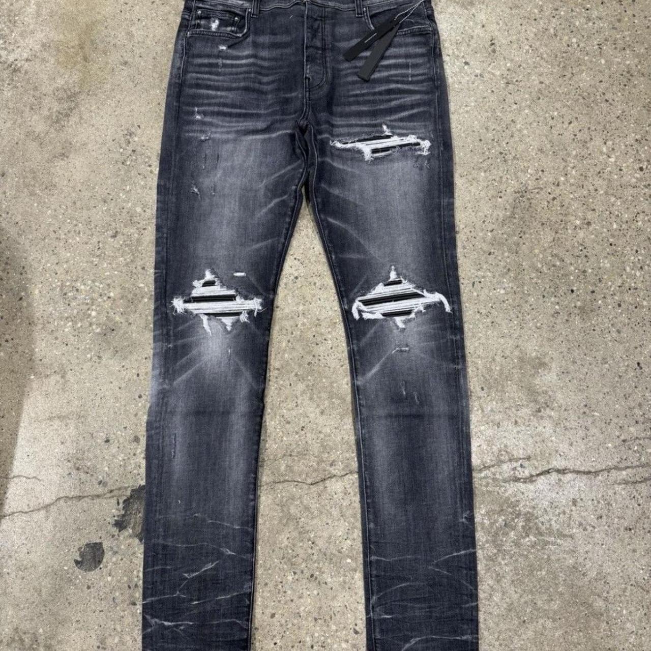 32 AMIRI MX1 JEAN STORM GREY