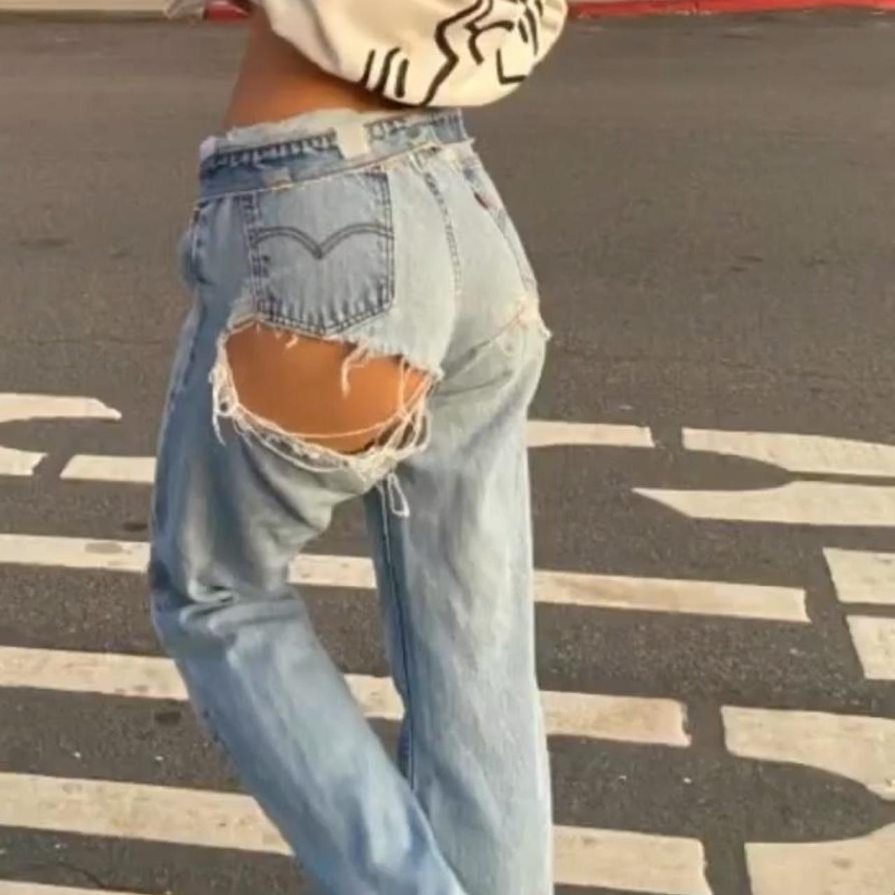 Levis ripped bum jeans on sale