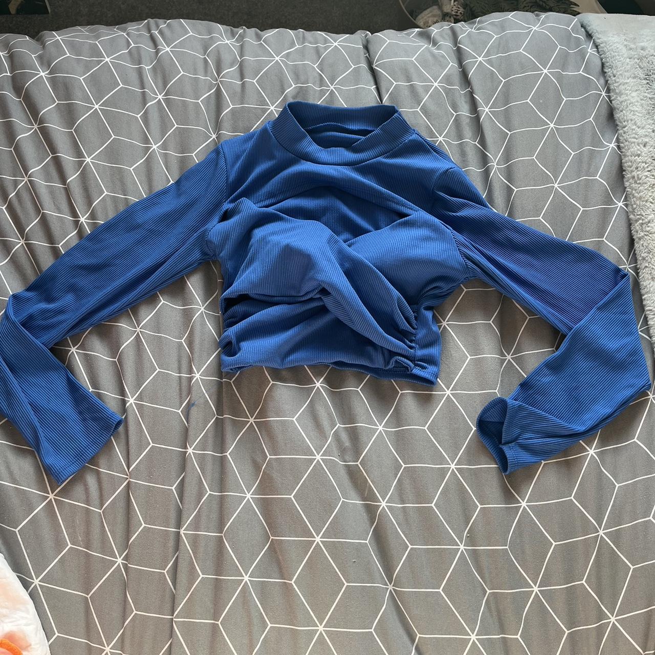 Blue ribbed open chest long sleeve crop top Size... Depop
