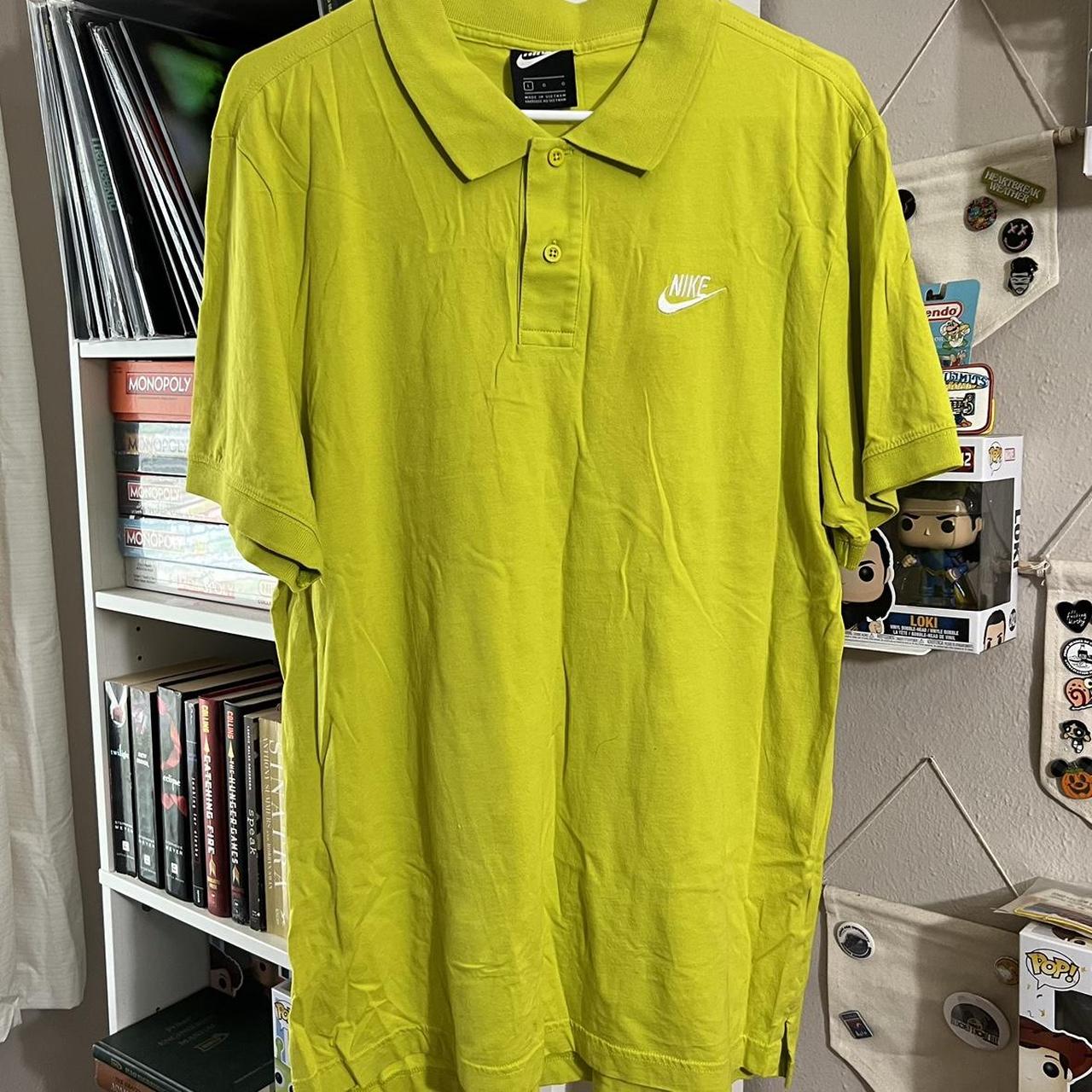yellow nike polo shirt