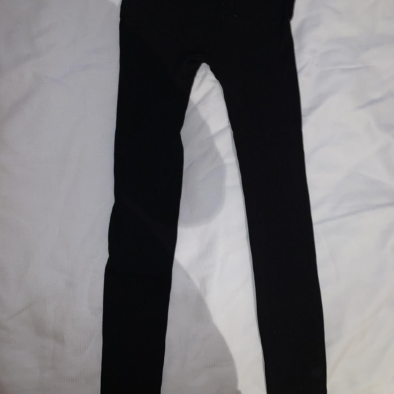 Black unaltered leggings with front wrap cross in... - Depop