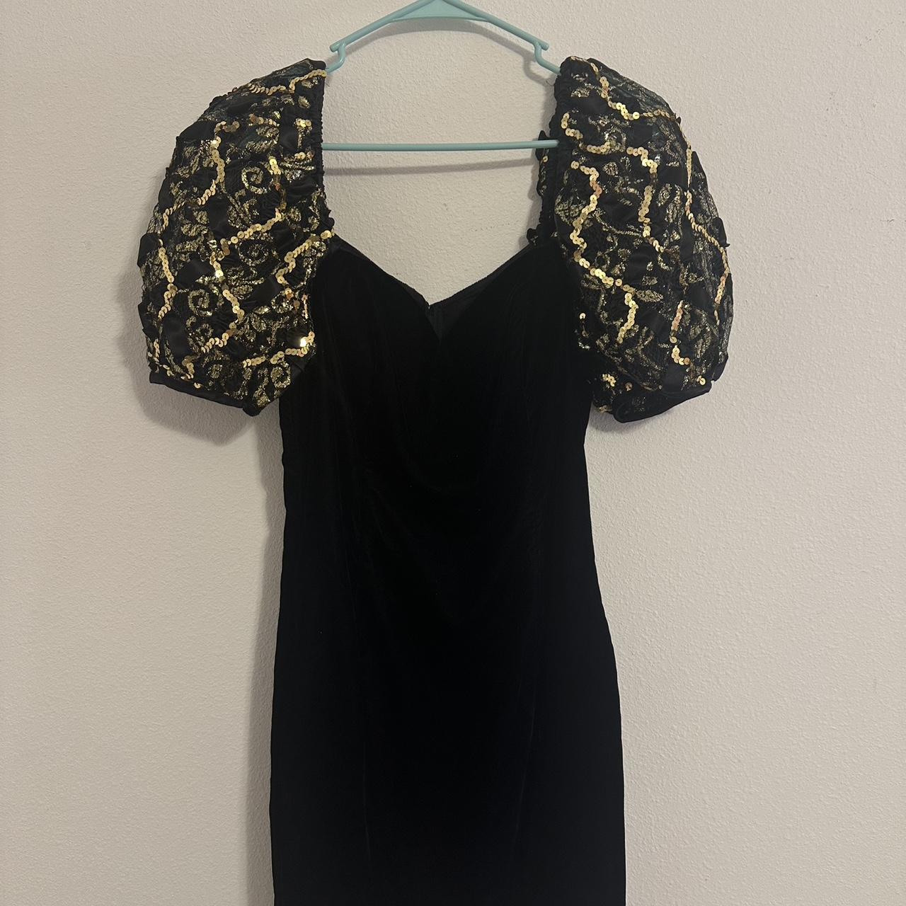 Black velvet dress with puffy sleeves with gold