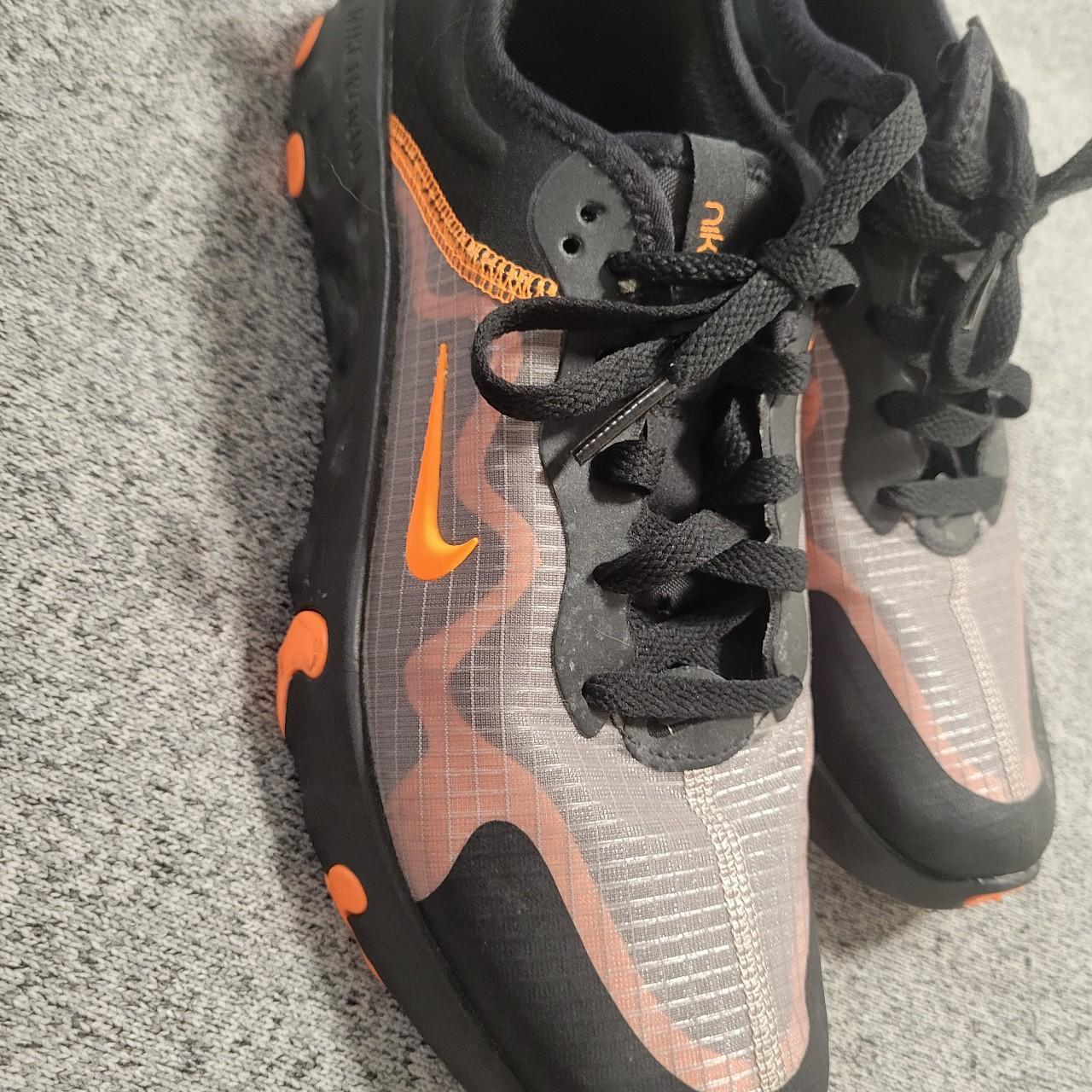 Nike Renew black and orange Depop - Main Image