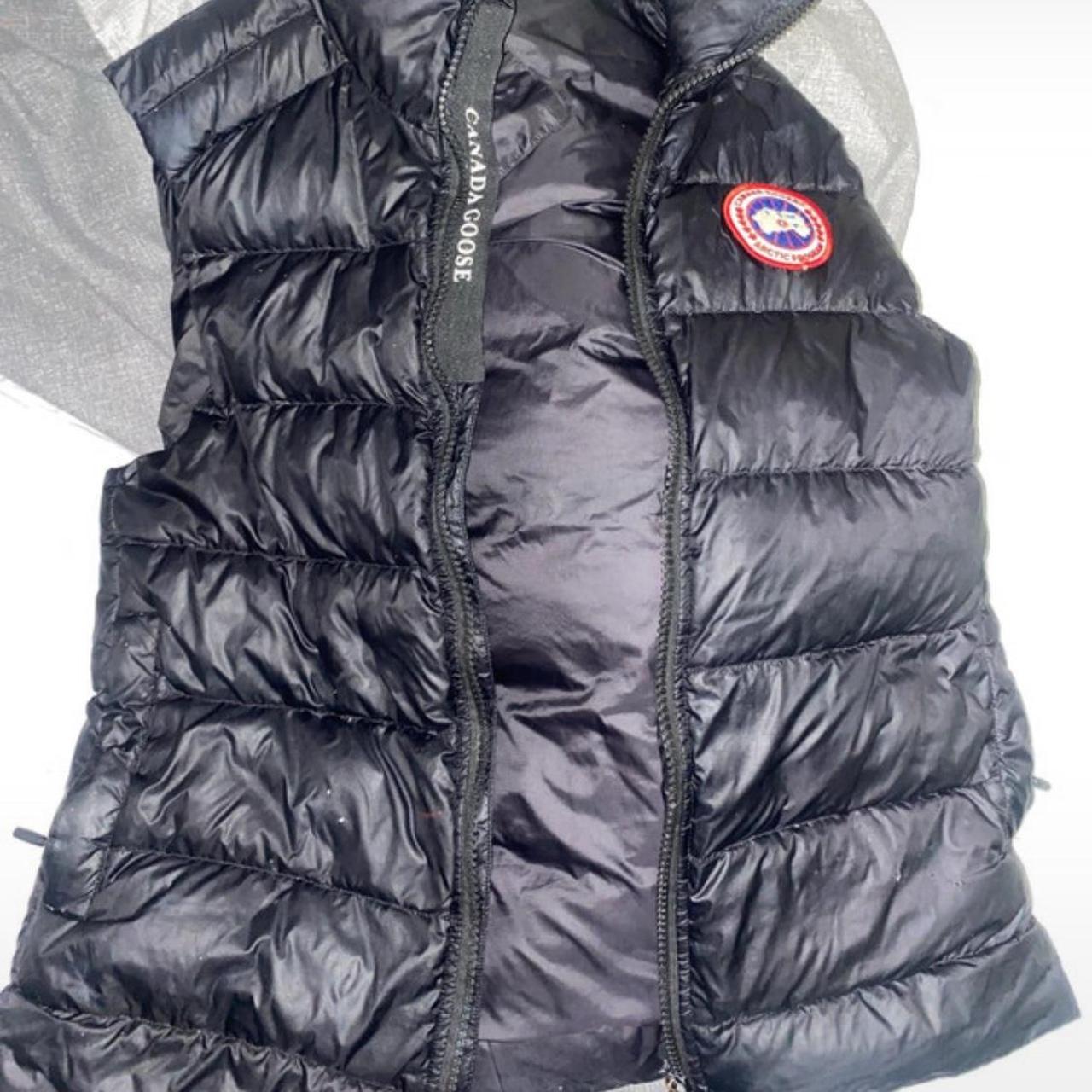 canada goose boys gilet XL has a couple wears and